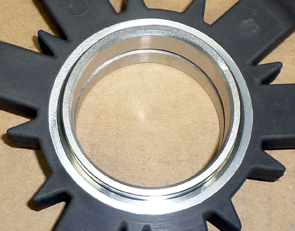 Successfully masked and anodized aluminum part with steel insert Successfully masked and anodized aluminum part with steel insert